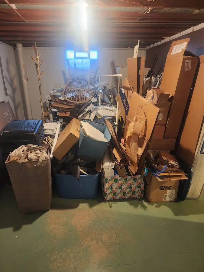 Roll-off dumpster container at job site for 20 Yard Dumpster Rental in McRae-Helena